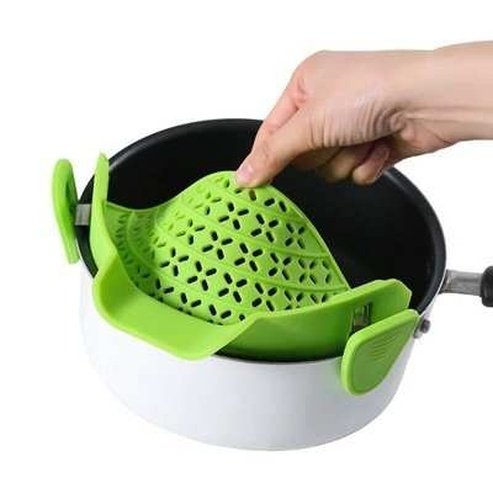 Strainer to drain excess liquid from the pot