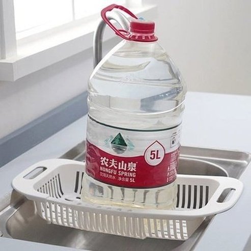 Create a luxurious kitchen experience with this Adjustable Sink Drainer Basket. Crafted from durable material with slim, height-adjustable legs, it allows you to strain and rinse food with ease, while its streamlined form adds a touch of sophistication to your home. A must-have for discerning chefs.