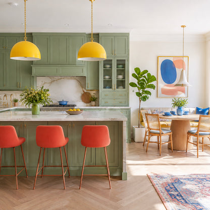 Pastel green kitchen with coral stools and yellow pendant lights