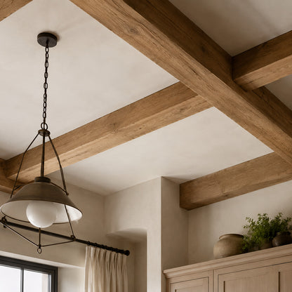 Farmhouse ceiling with exposed wooden beams and pendant lighting